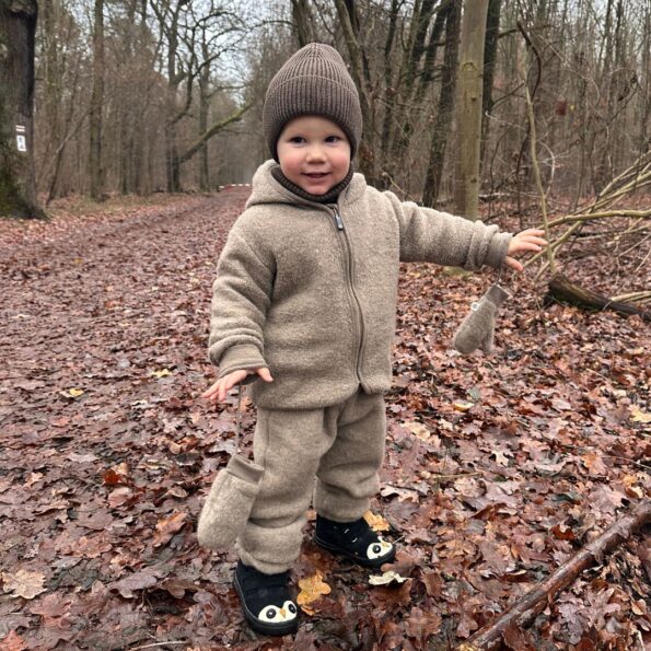 Dětské kalhoty z merino vlny s nastavitelným pasem.